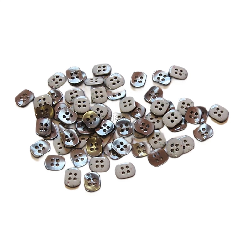 Guziki plastikowe nr 373 / 1 cm x 0,7 mm / 10 szt