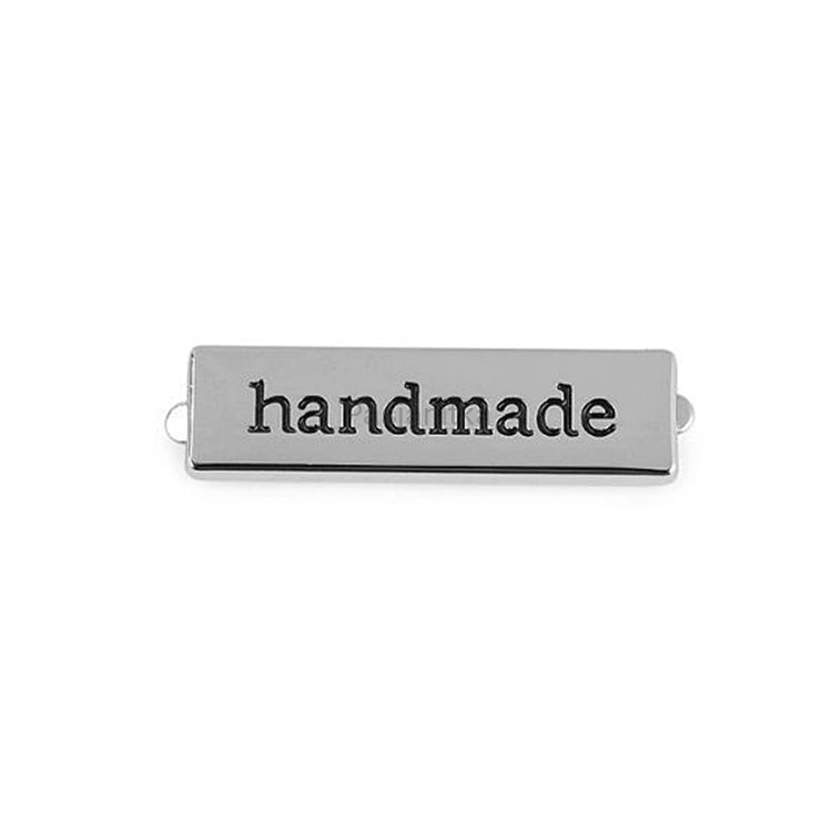 Metka metalowa "Handmade" 10 x 35 mm / srebrny